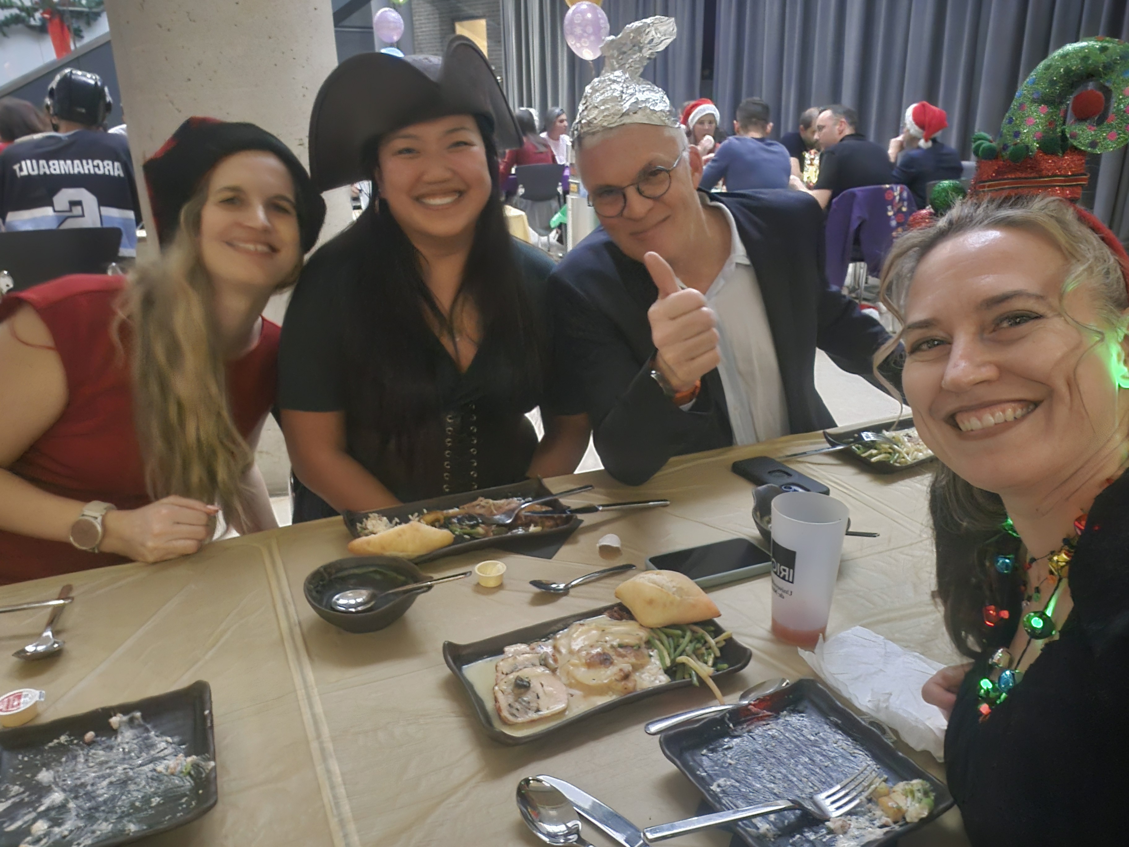 Costumes, good food, and great company at the holiday party.